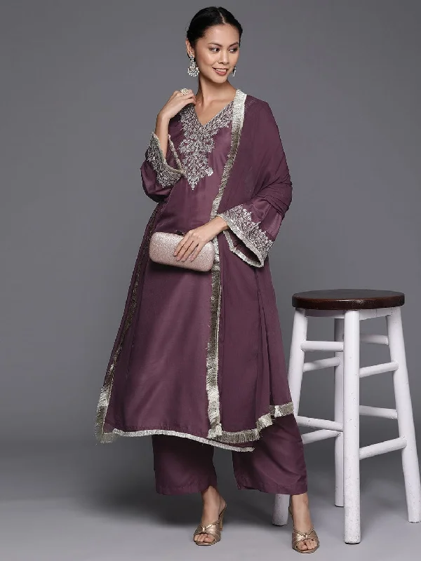 Varanga mauve V-neck yoke embroidered straight kurta with fringes hem paired with tonal bottom and tonal dupatta with fringes